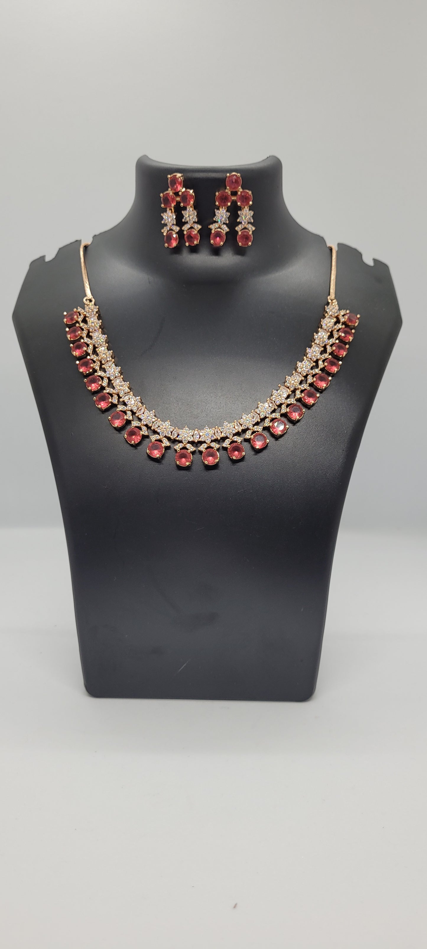 Golden Necklace Set with Light Red and White American Diamond Stones & Earrings