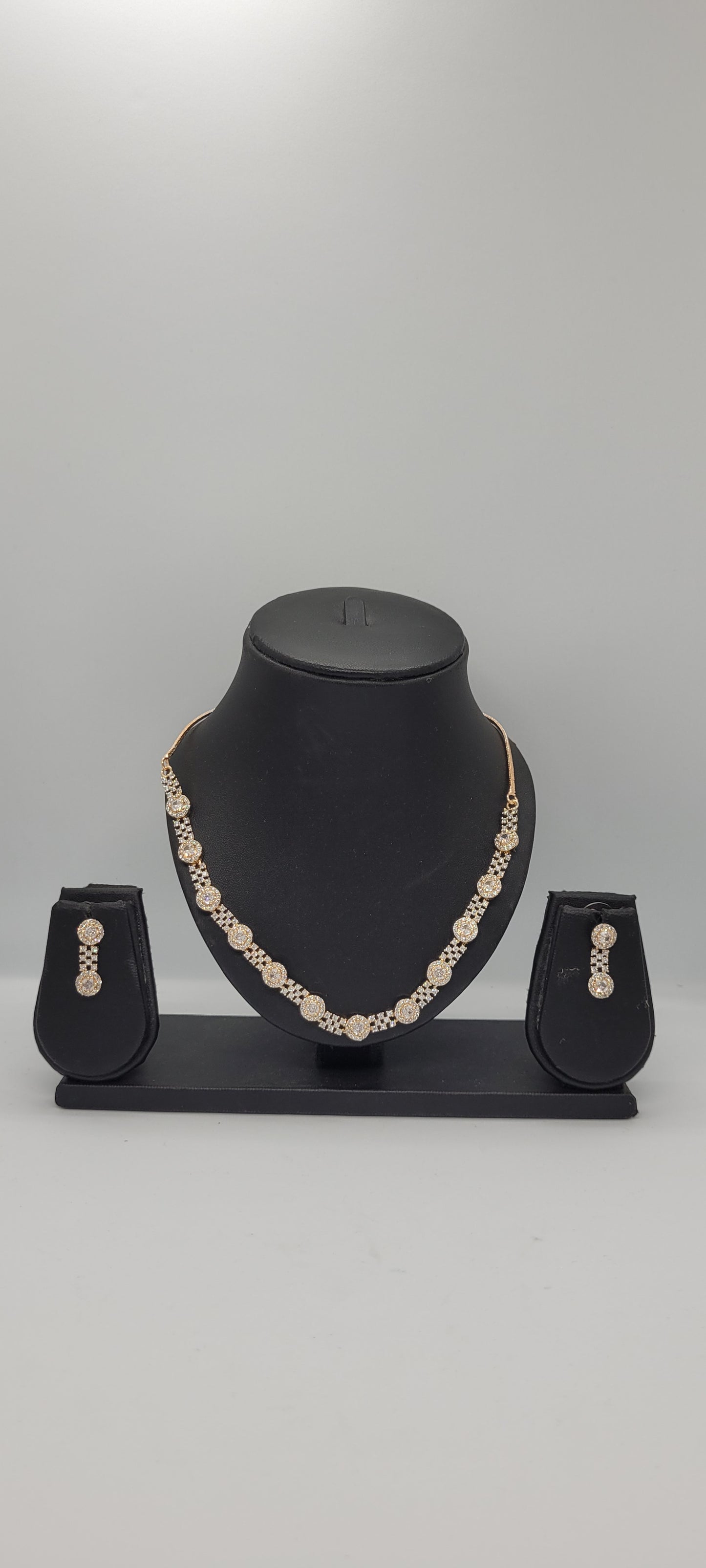 Golden Necklace Set with White American Diamond Stones & Earrings