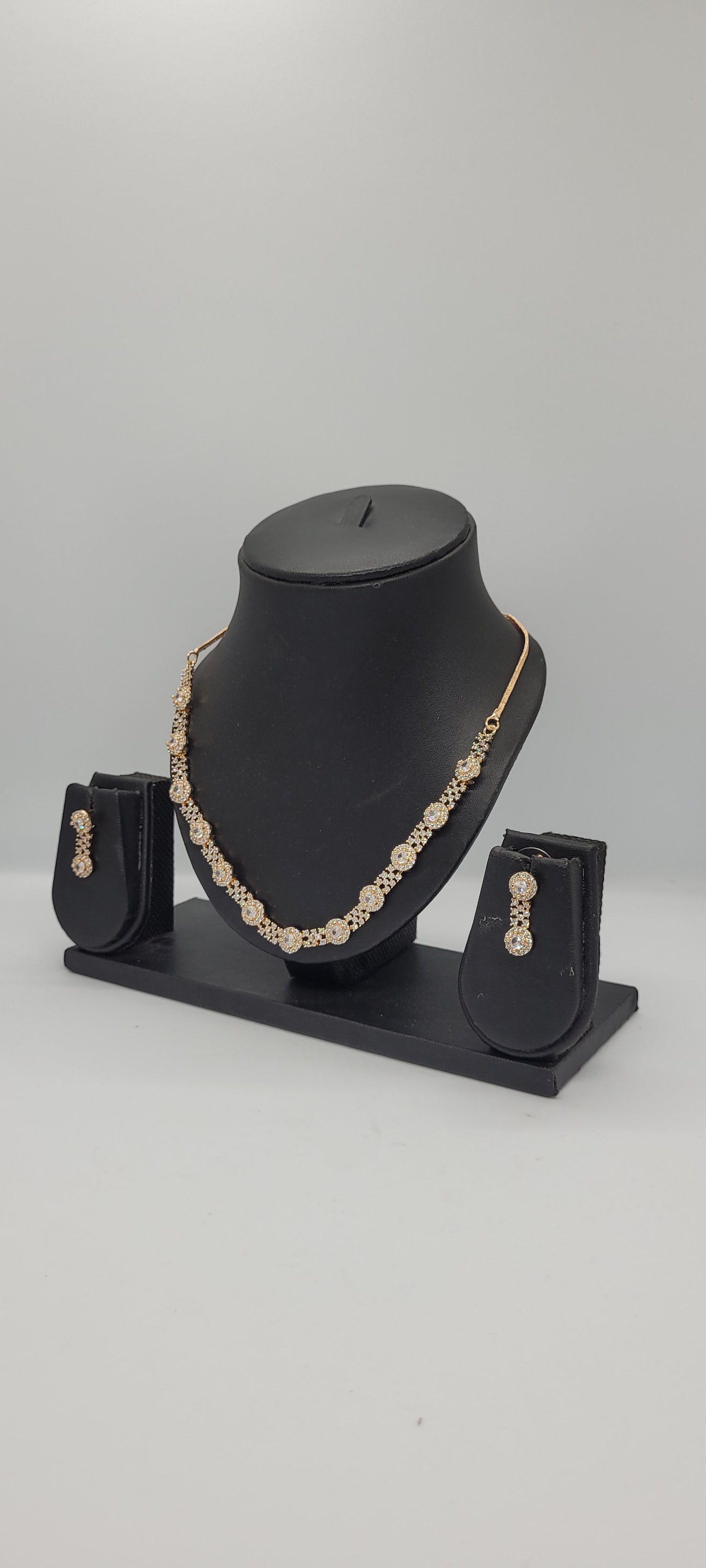 Golden Necklace Set with White American Diamond Stones & Earrings