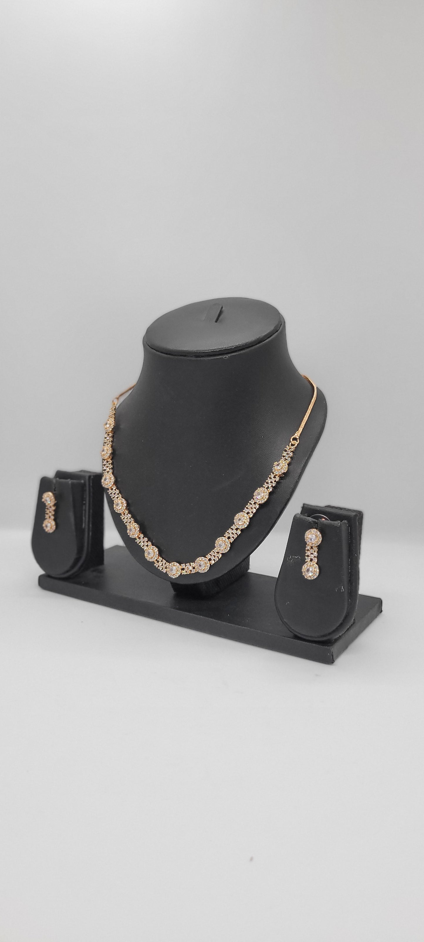 Golden Necklace Set with White American Diamond Stones & Earrings