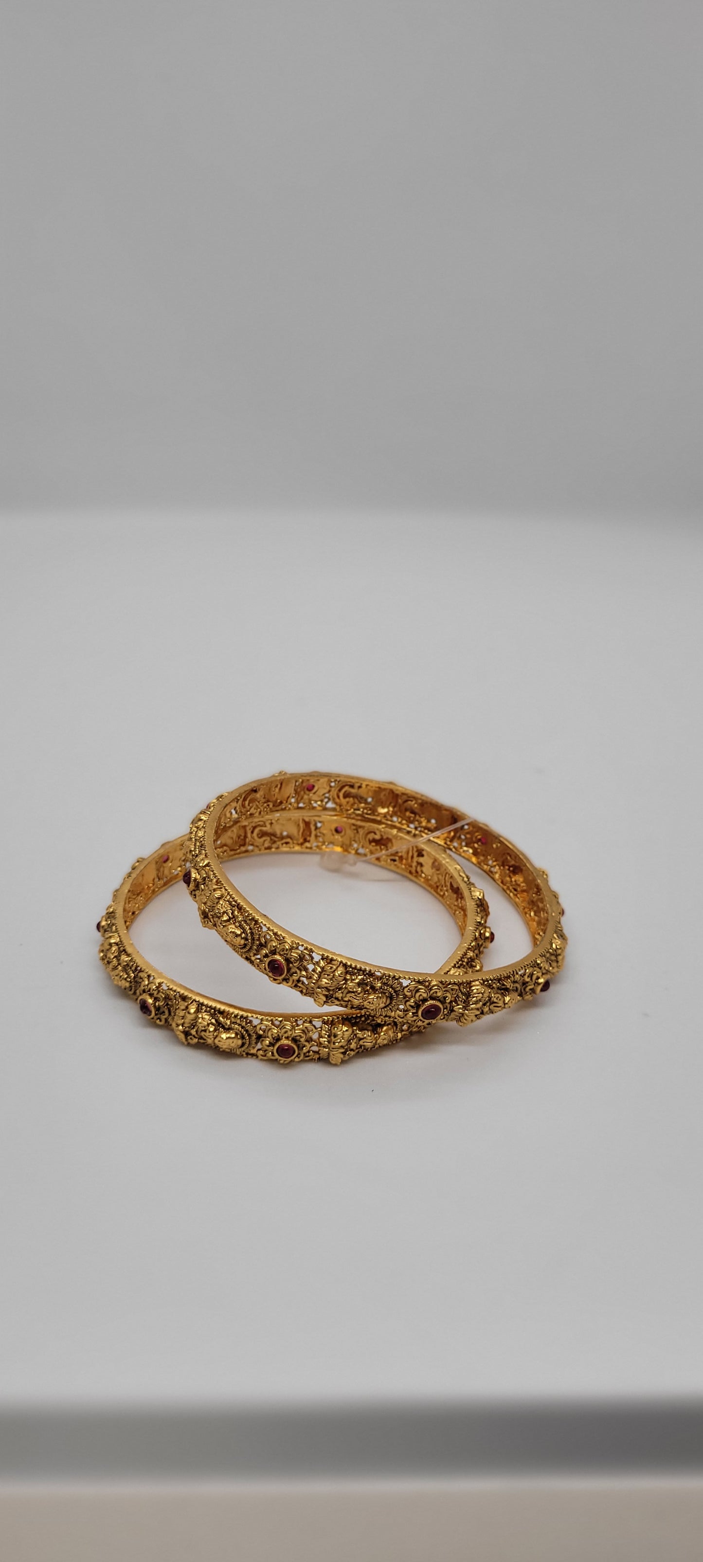 Golden Antique Temple Collections Bangles (2 piece) with Red Stones