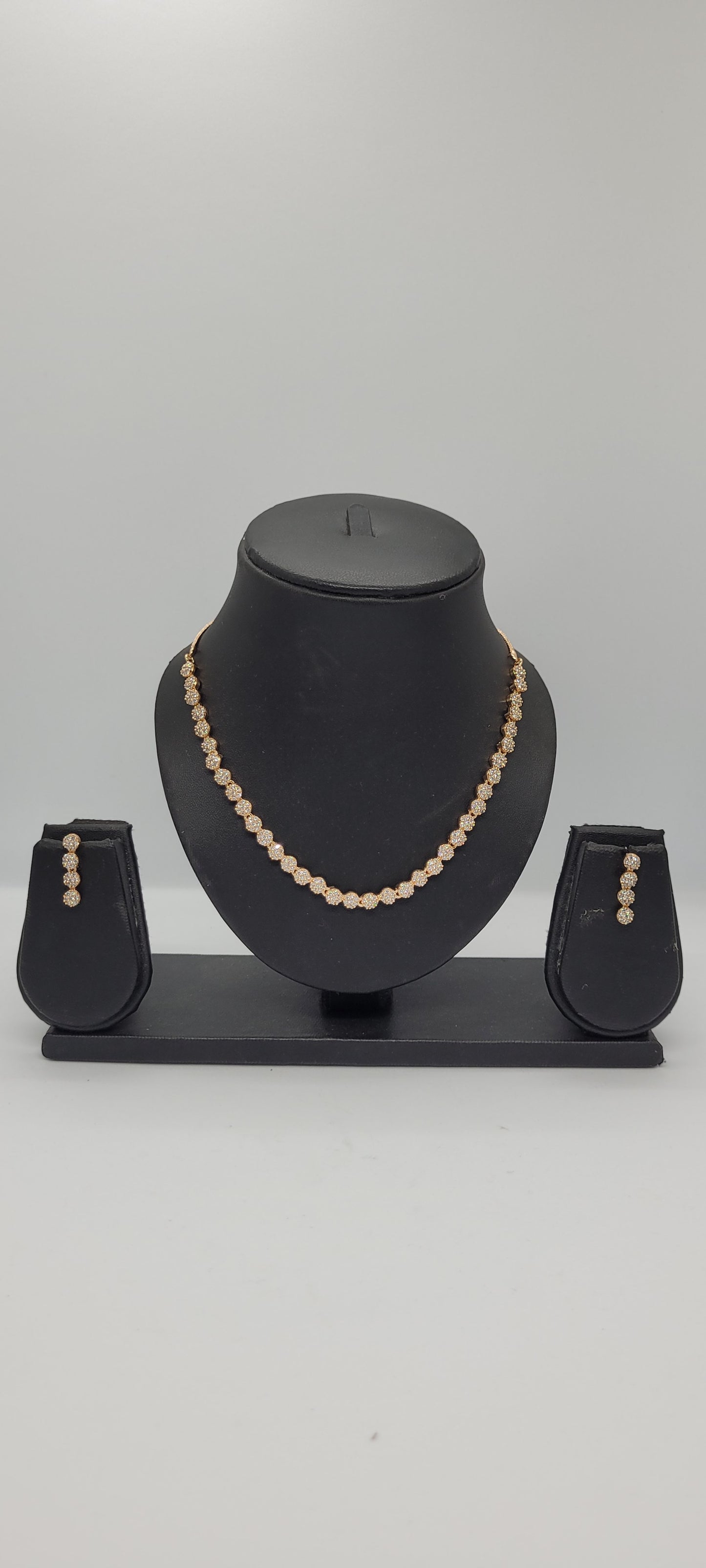 Golden Necklace Set with White American Diamond Stones & Earrings