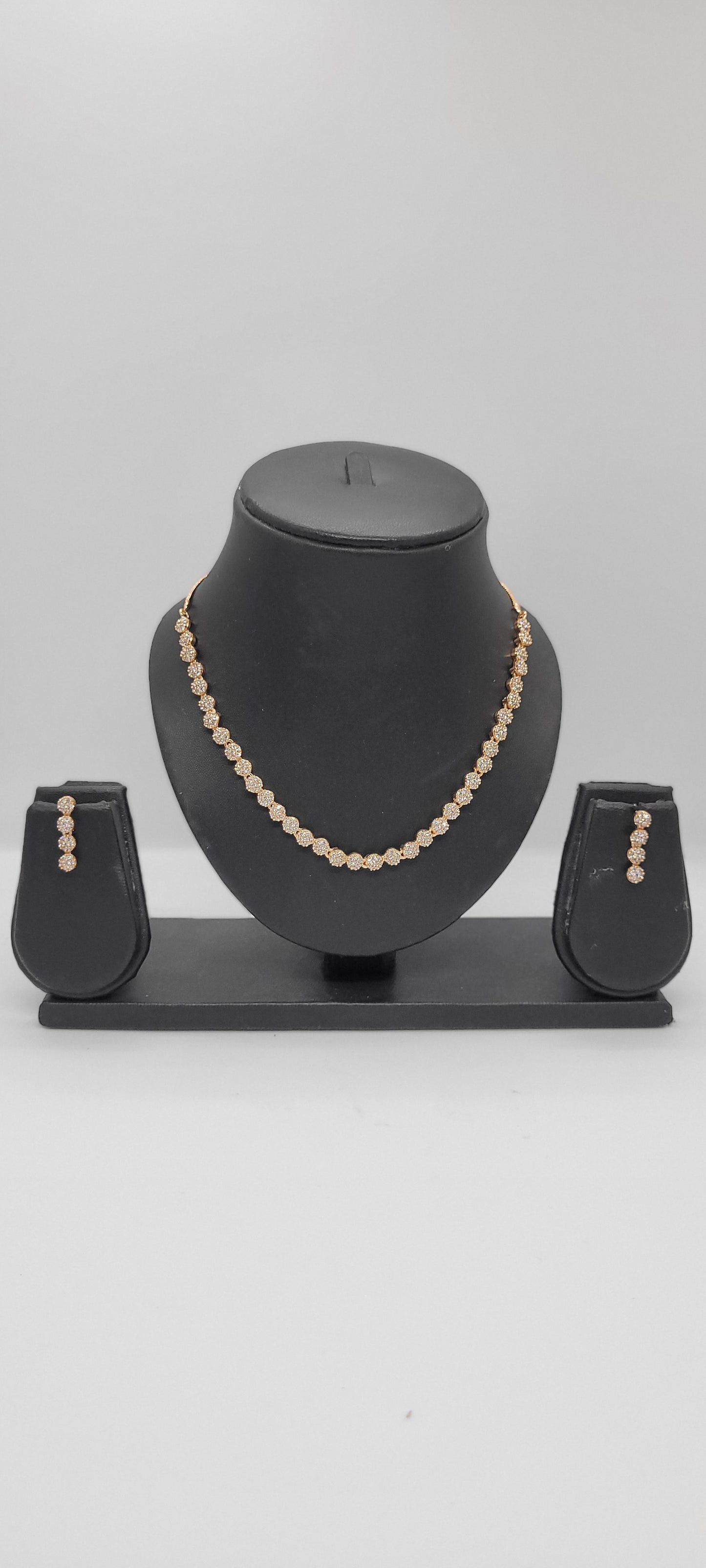 Golden Necklace Set with White American Diamond Stones & Earrings