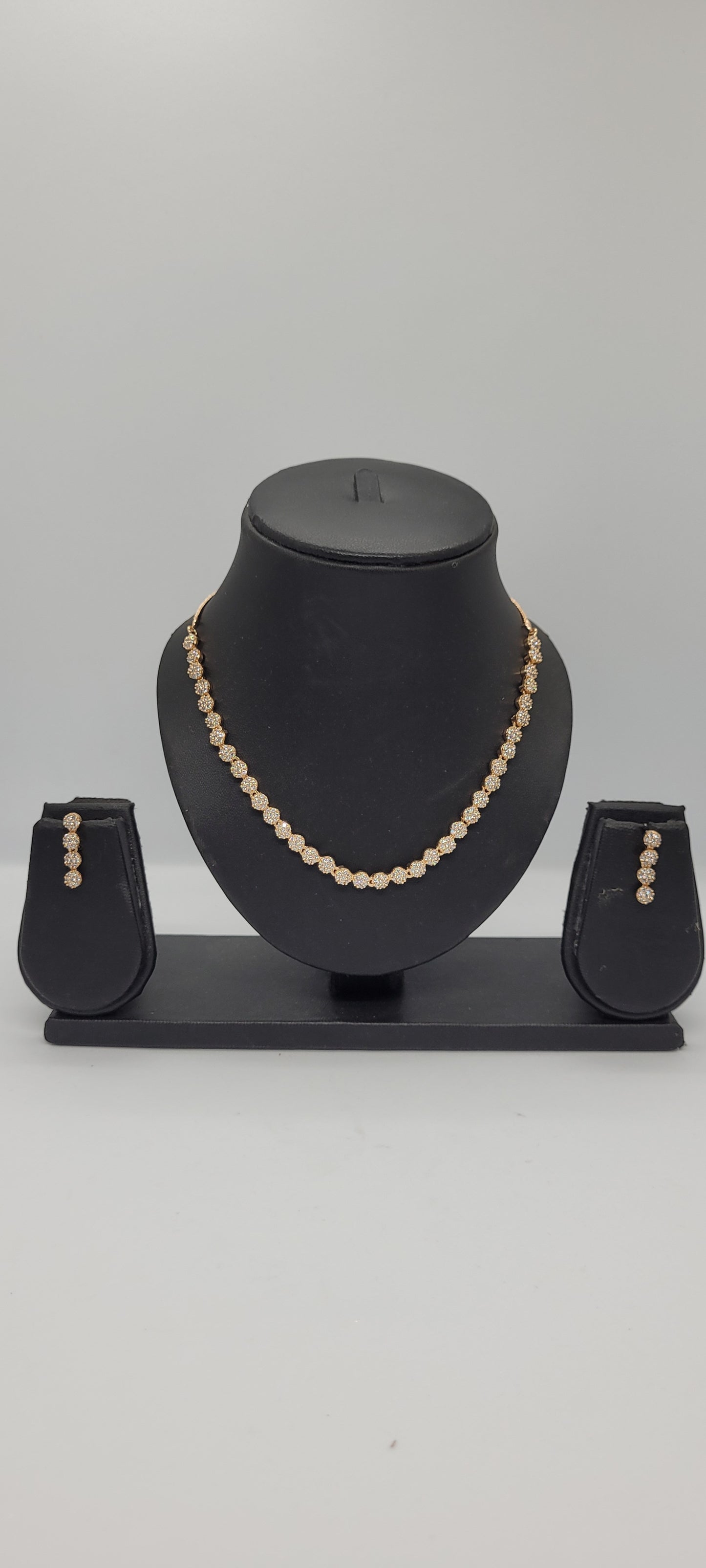 Golden Necklace Set with White American Diamond Stones & Earrings